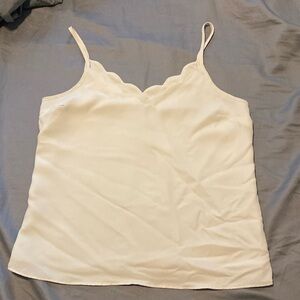 Cream colored camisole top with scalloped collar
